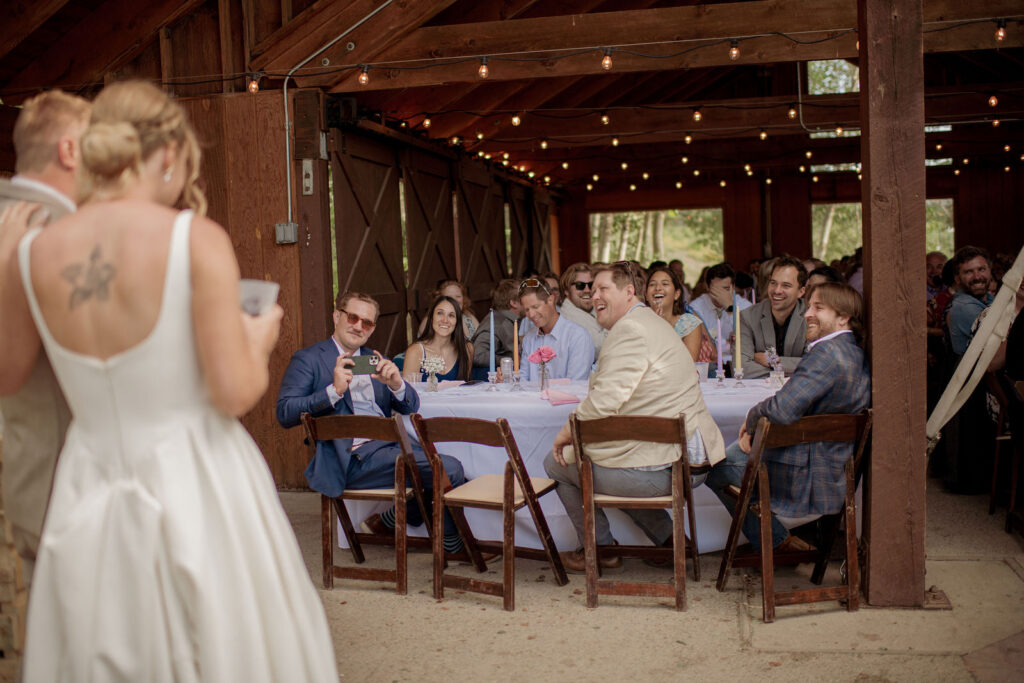 laughter during wedding toast reception
