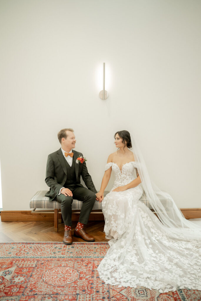 Couple sitting holding hands