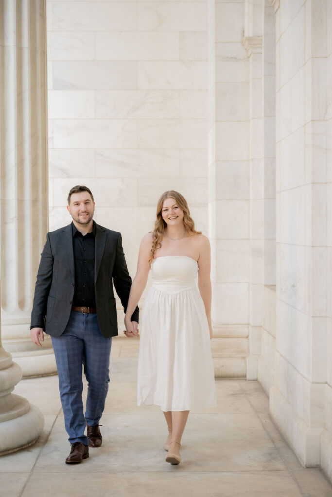 Sarah’s flowing white dress & Andy’s tailored dark outfit