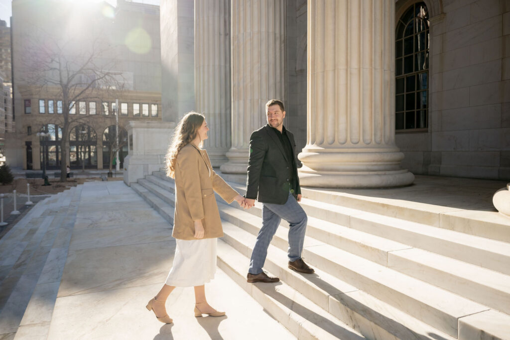 walking hand in hand across the steps