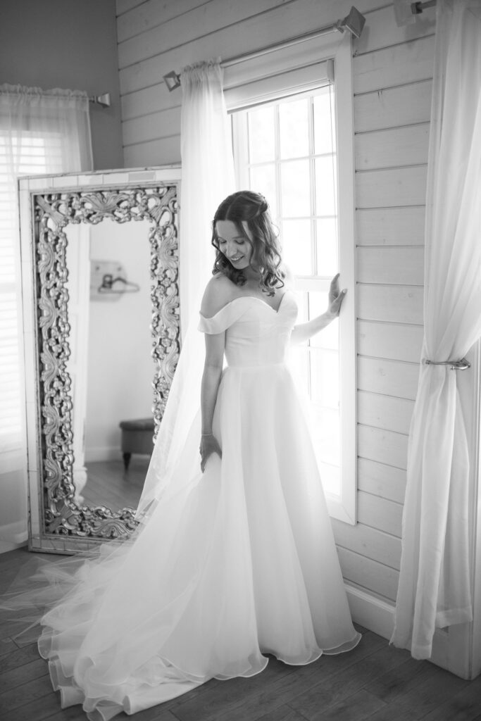 Anna looking at her wedding dress