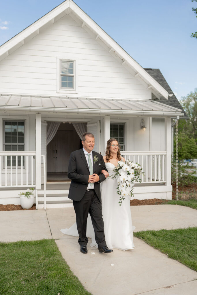 Anna walks down the aisle with her Dad