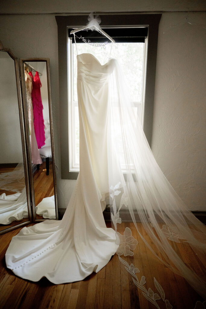 Anna's gown hung by the window