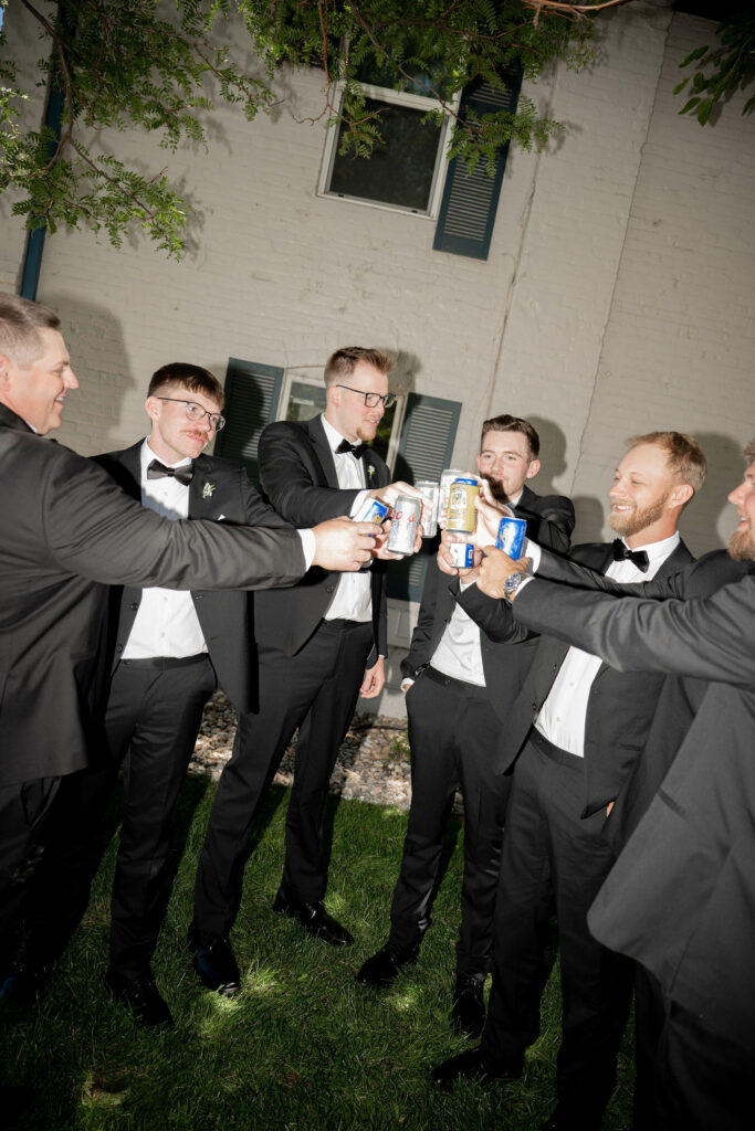 Boys cheering with their drinks