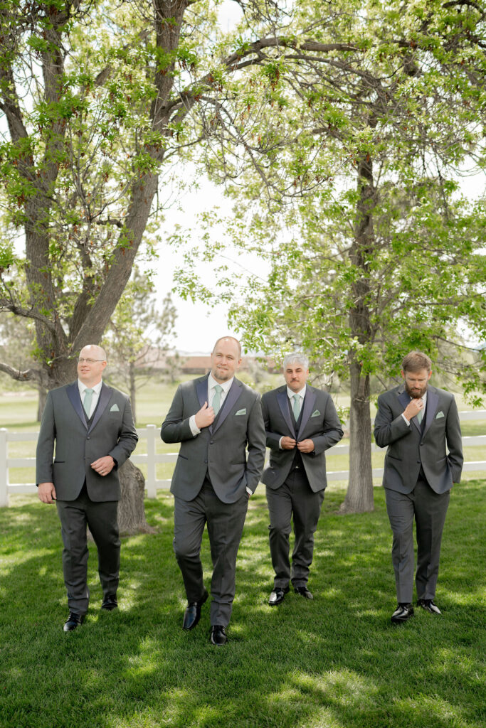 Suits on, ties straightened