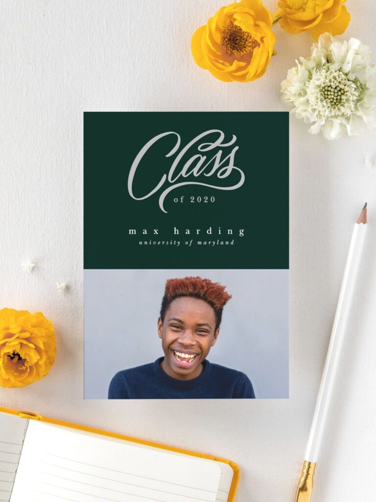 "Class of 2020" announcement card with photo, surrounded by flowers.