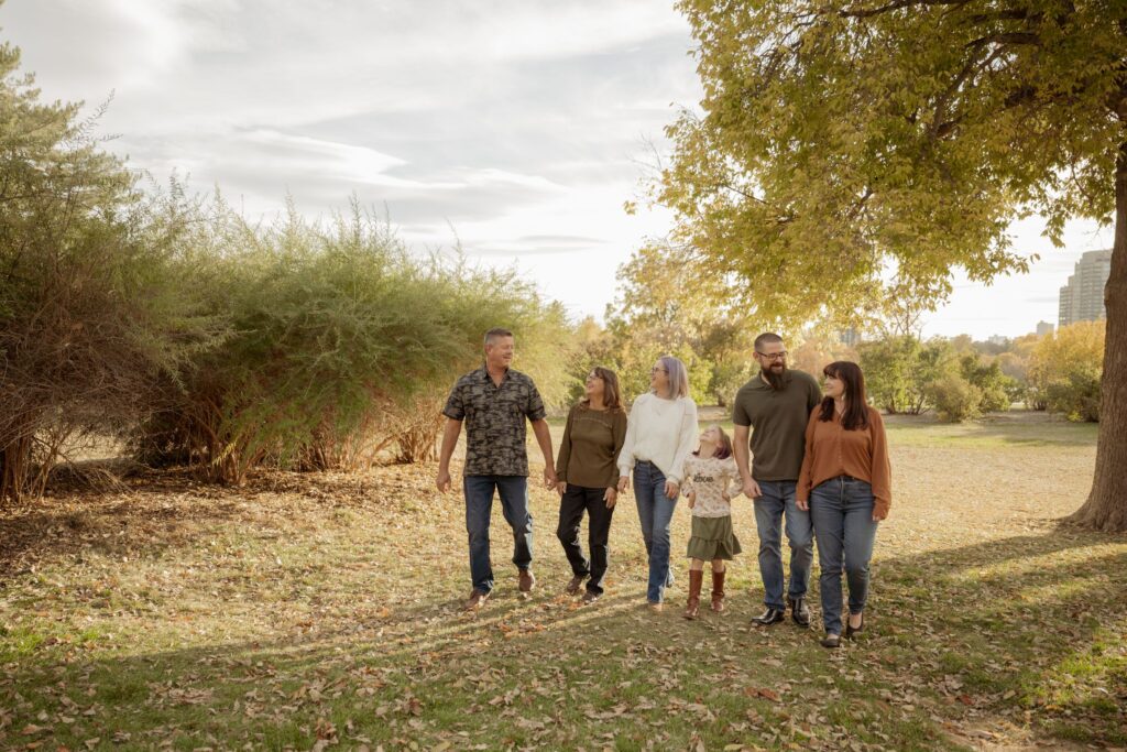 Three generation family walking together.