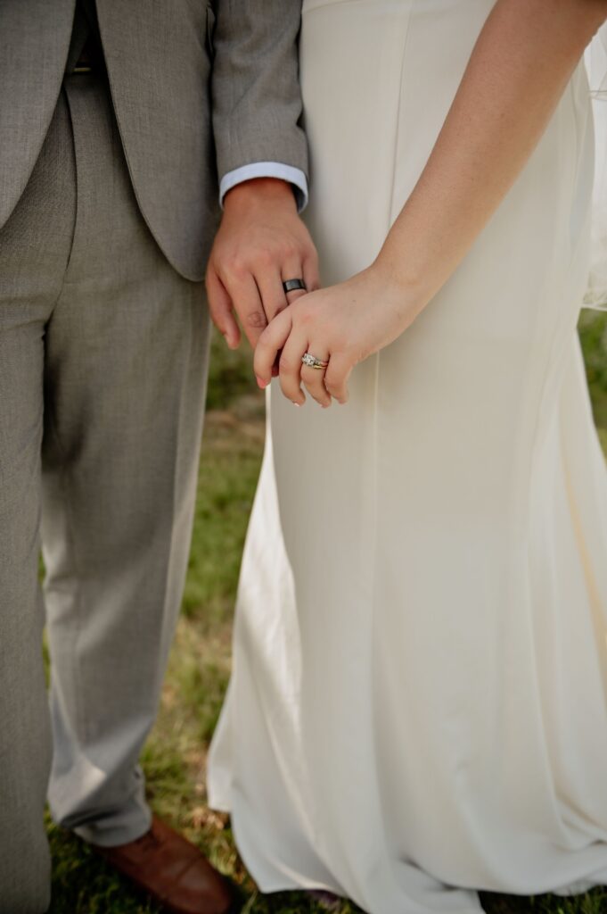 Bride and Groom Holding Hands