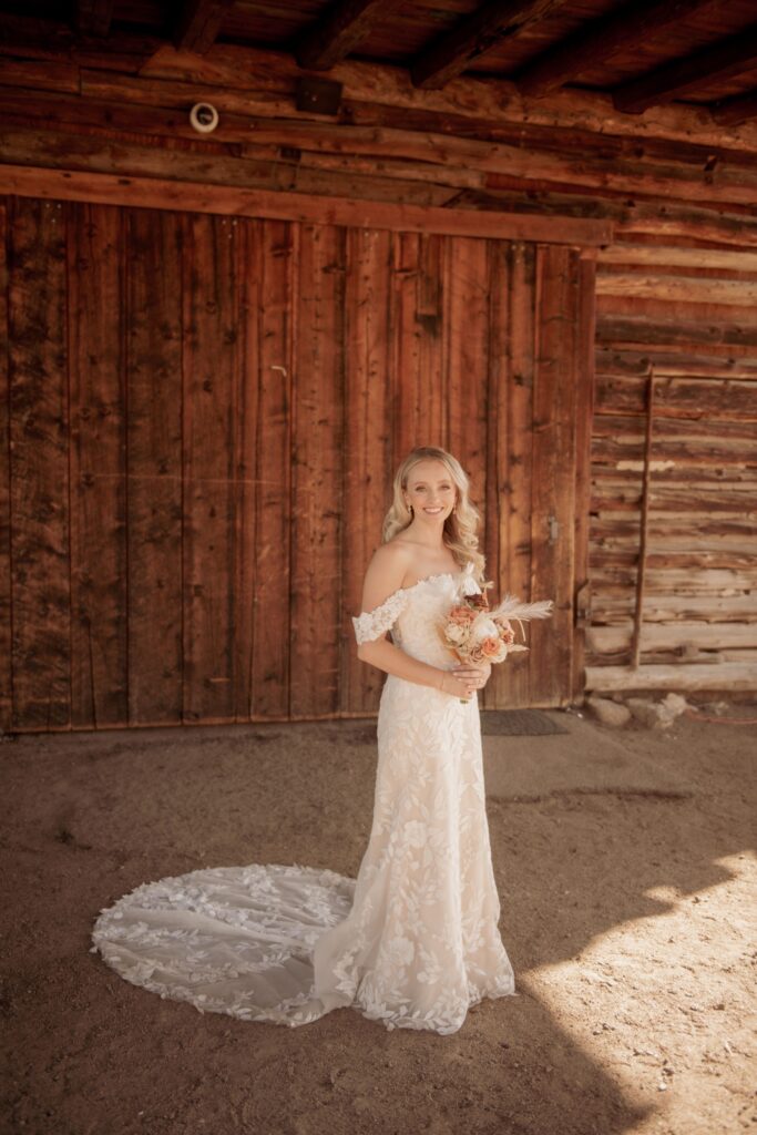 Bride by rustic barn