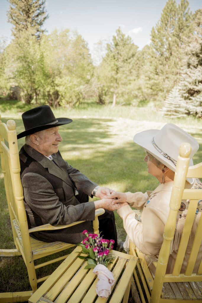 Couple Sitting Together Outdoors