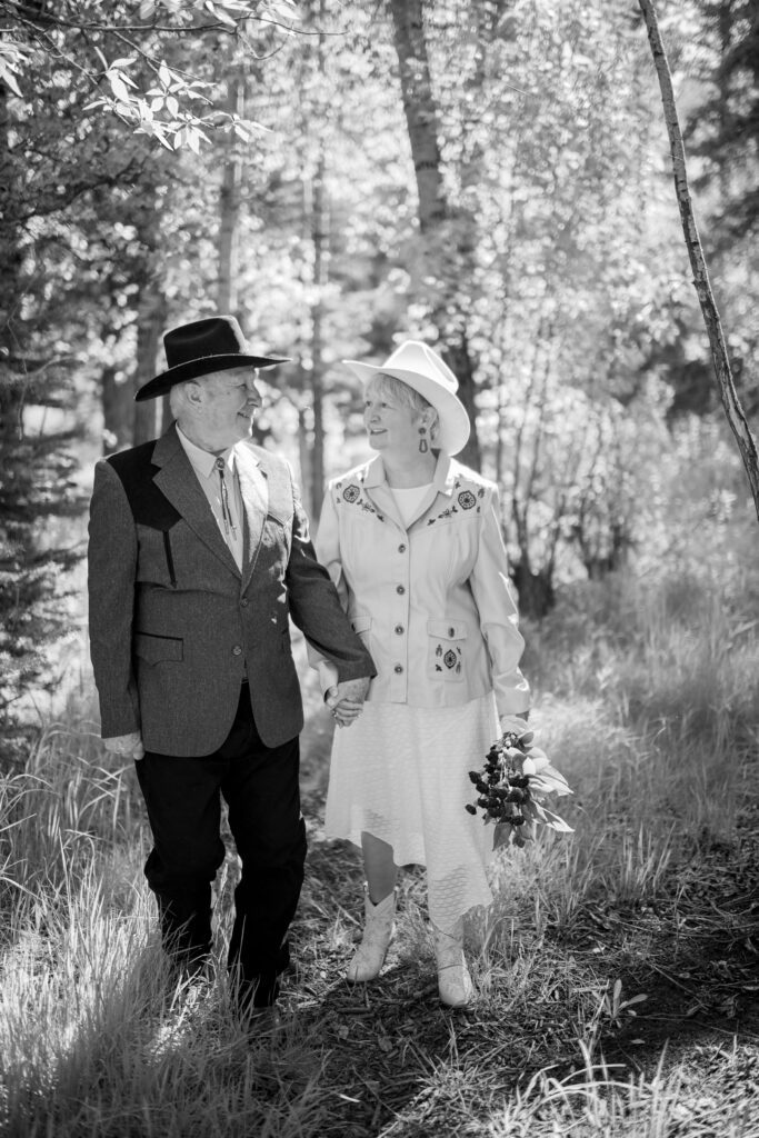 Couple Walking Through the Forest