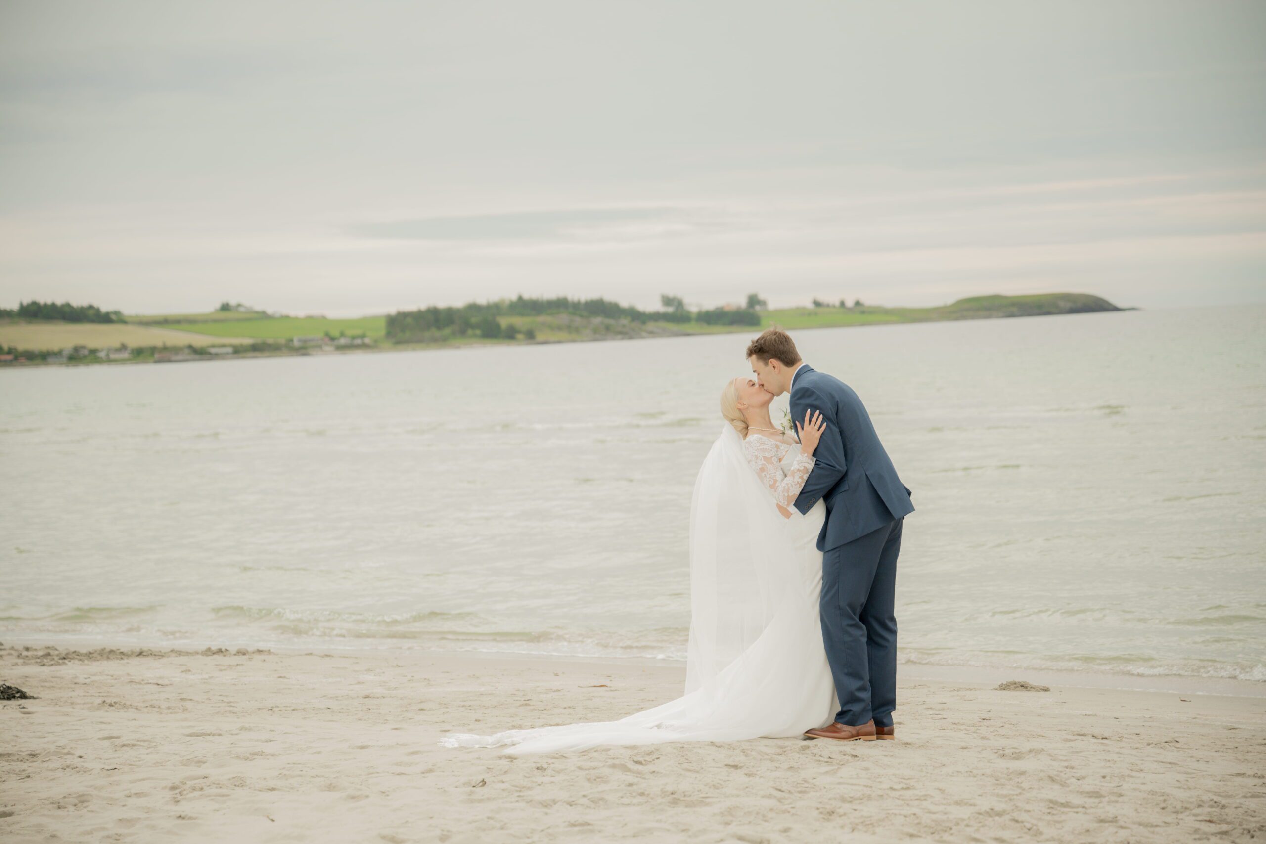 Couple kissing on the beach