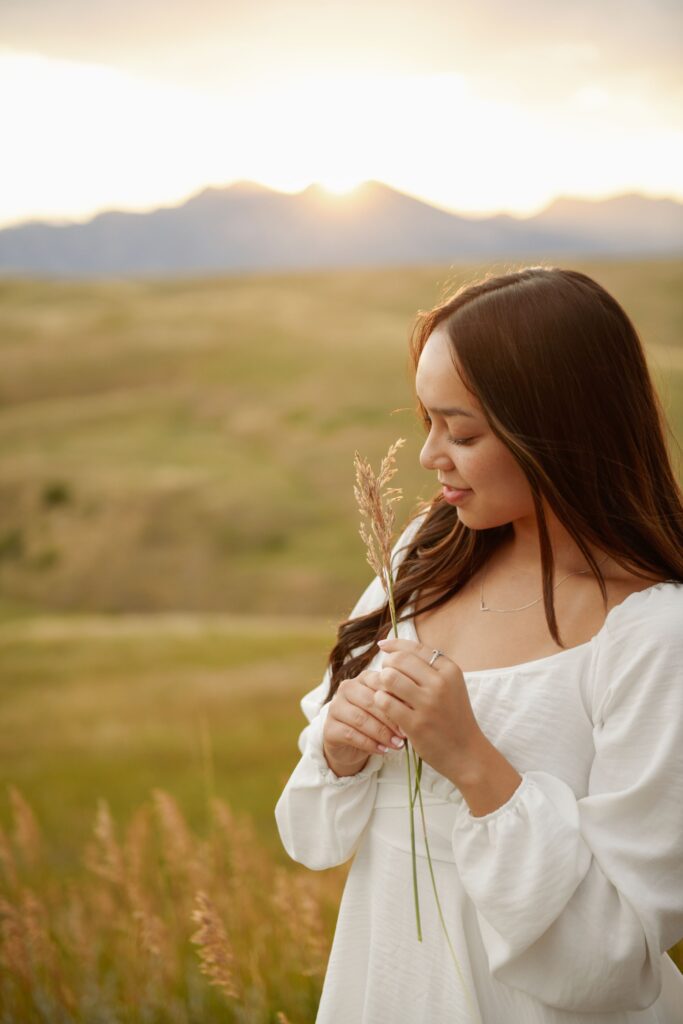 Girl playing with grass