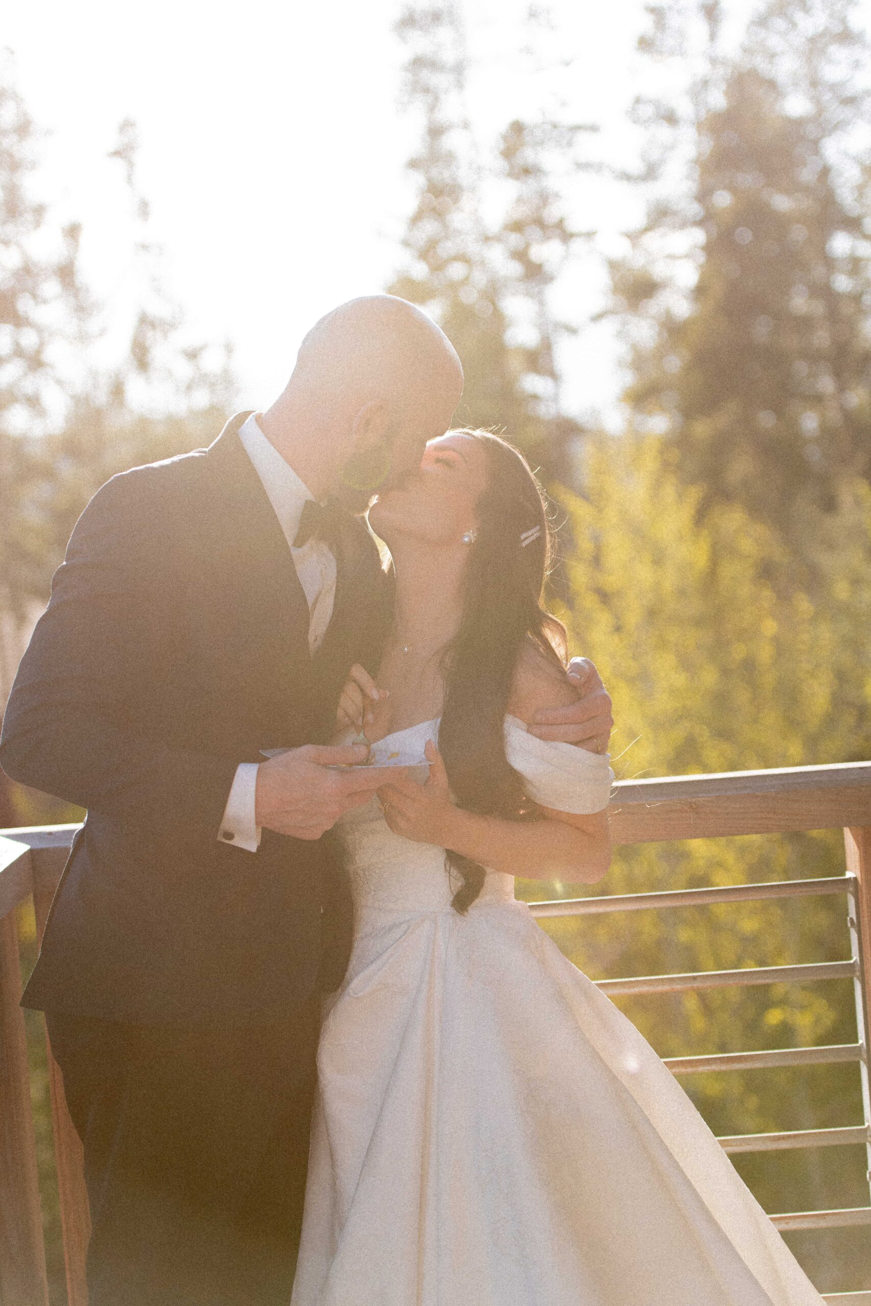 Golden hour first kiss, Colorado sunset wedding