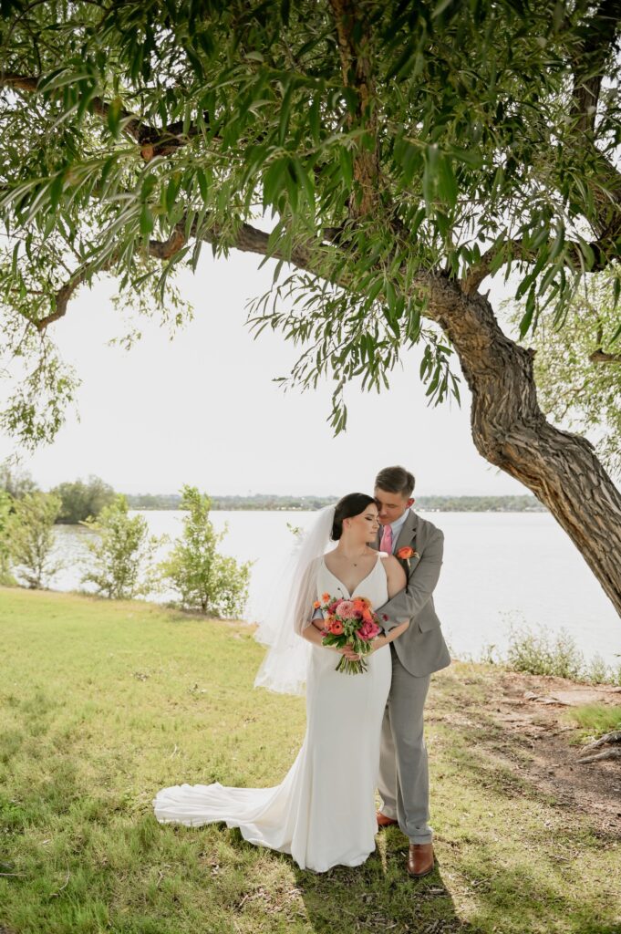 Bride and Groom under a tree