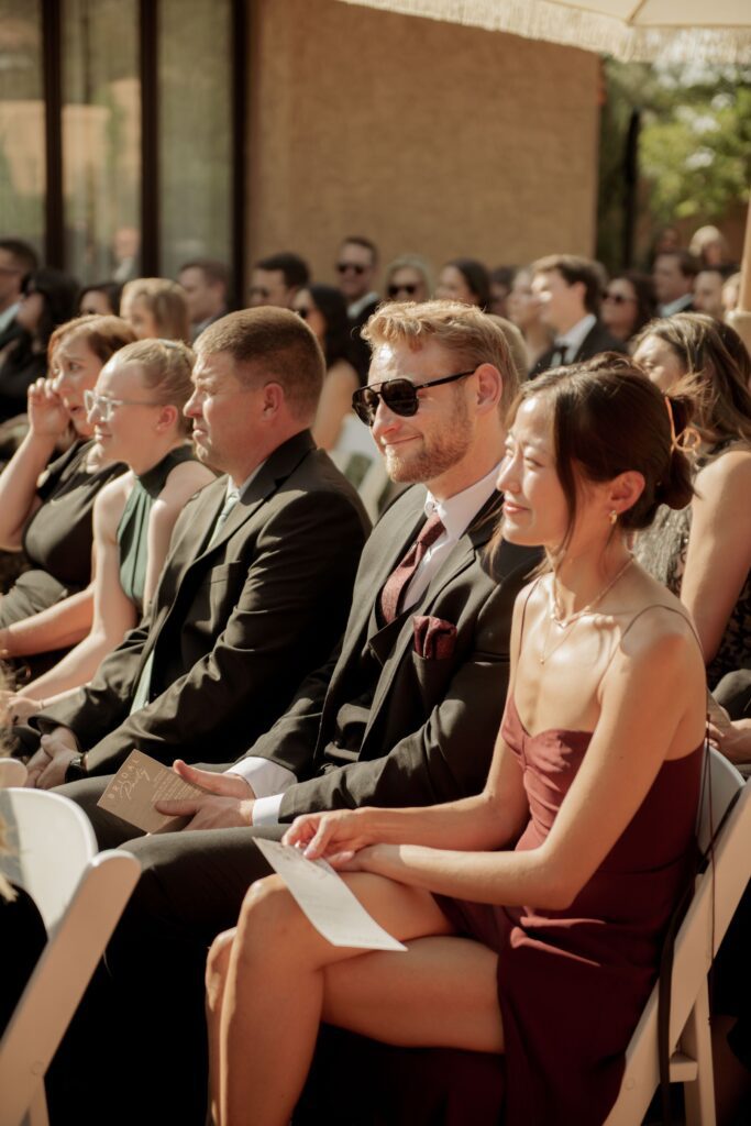 Wedding Guests Seated During Outdoor Ceremony
