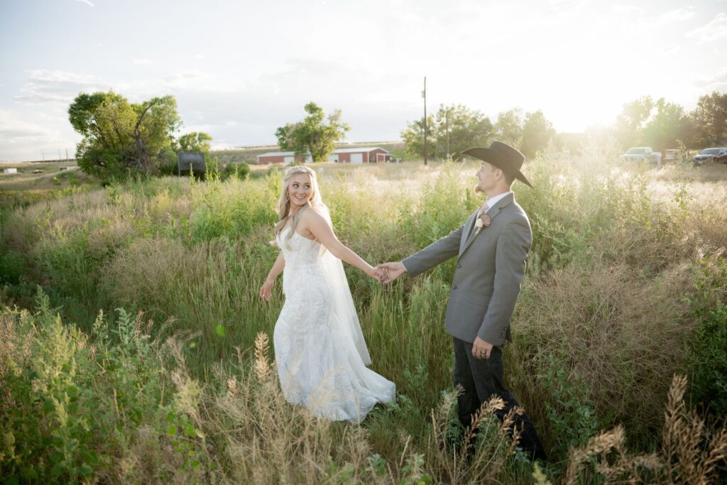 Bride and Groom holding hands