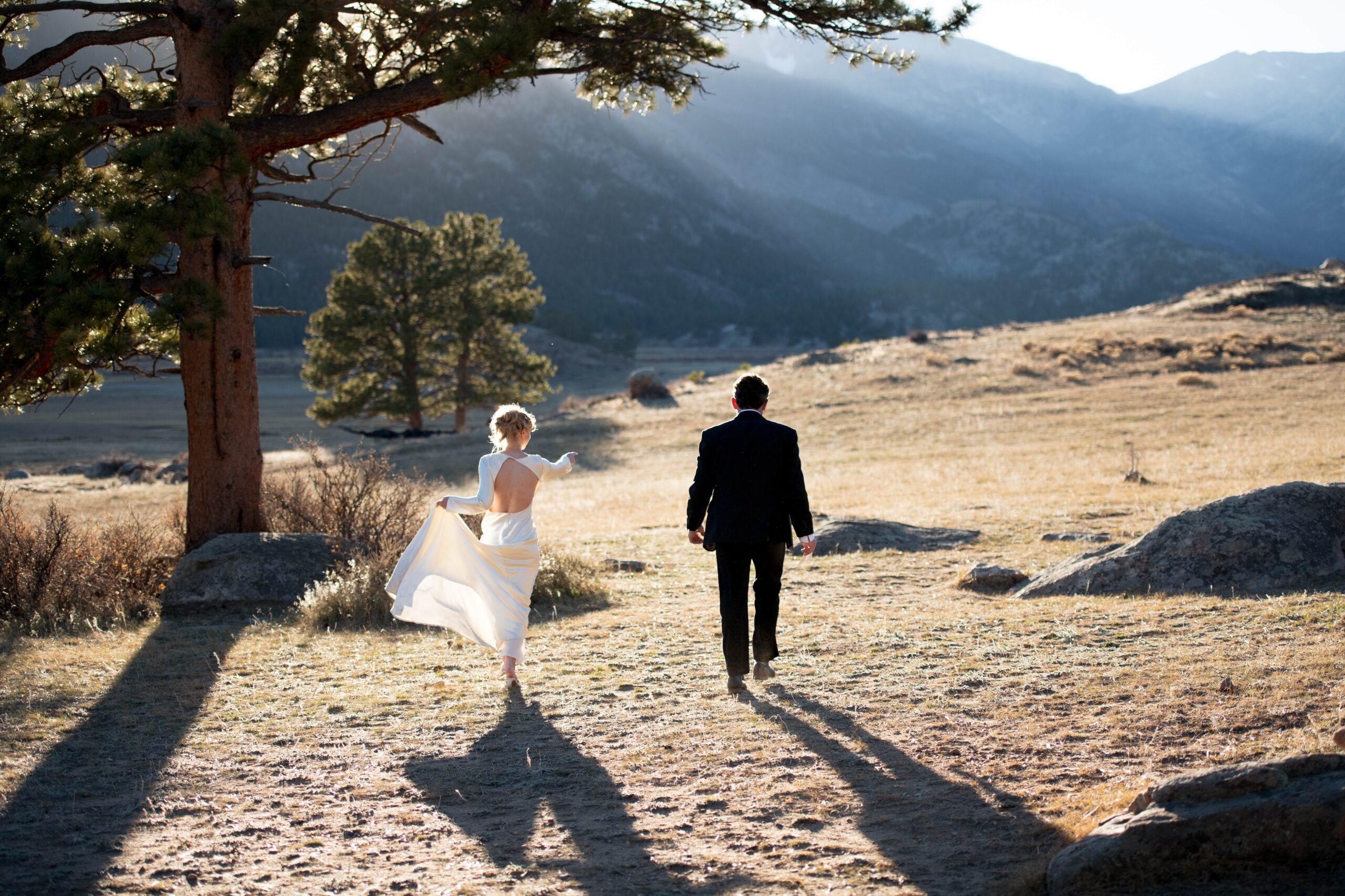 Bride and groom in front of mountain