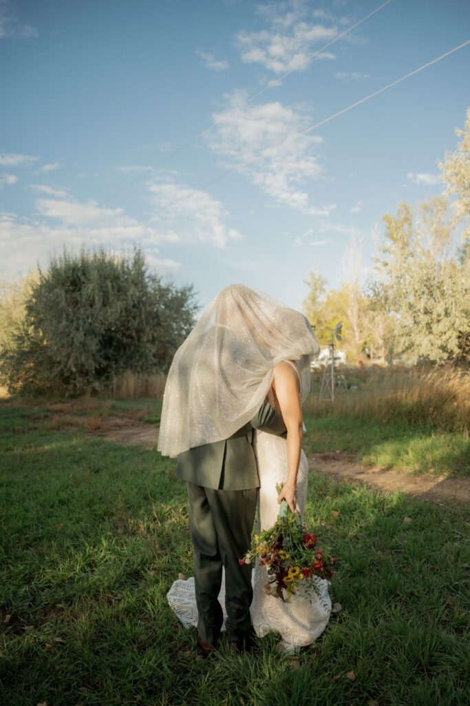 Bride and Groom under the veil