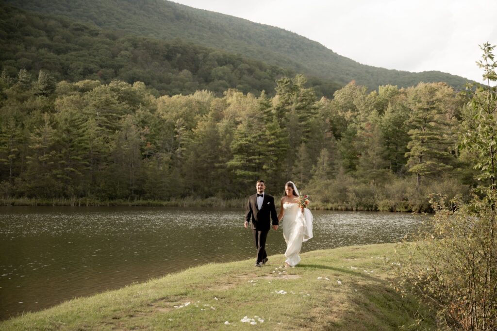 Bride and groom by the lake