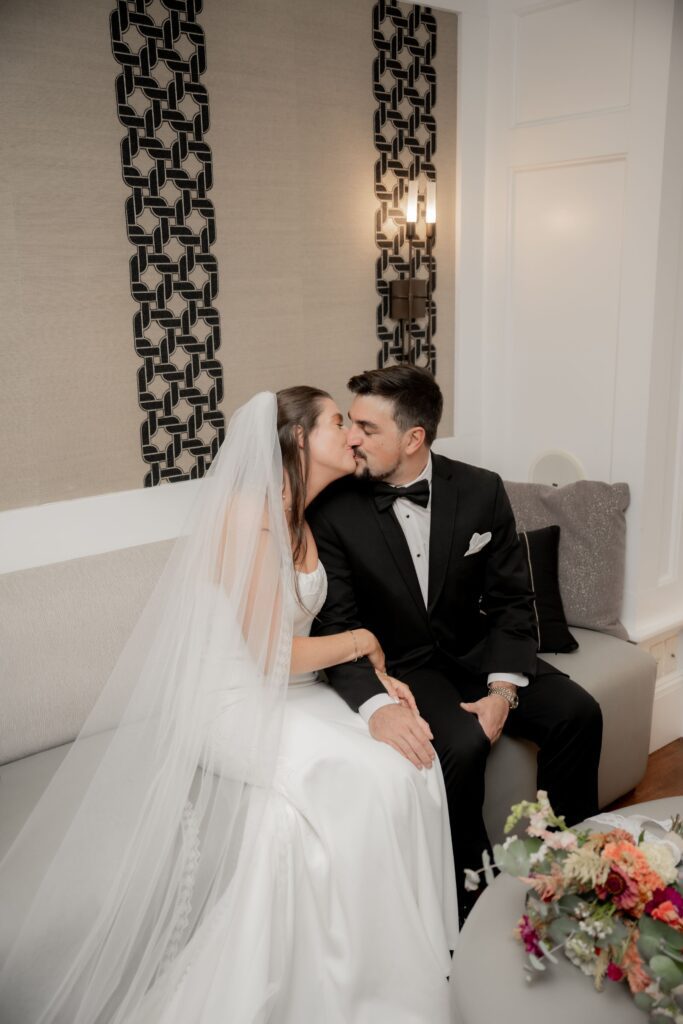 Bride and groom kissing