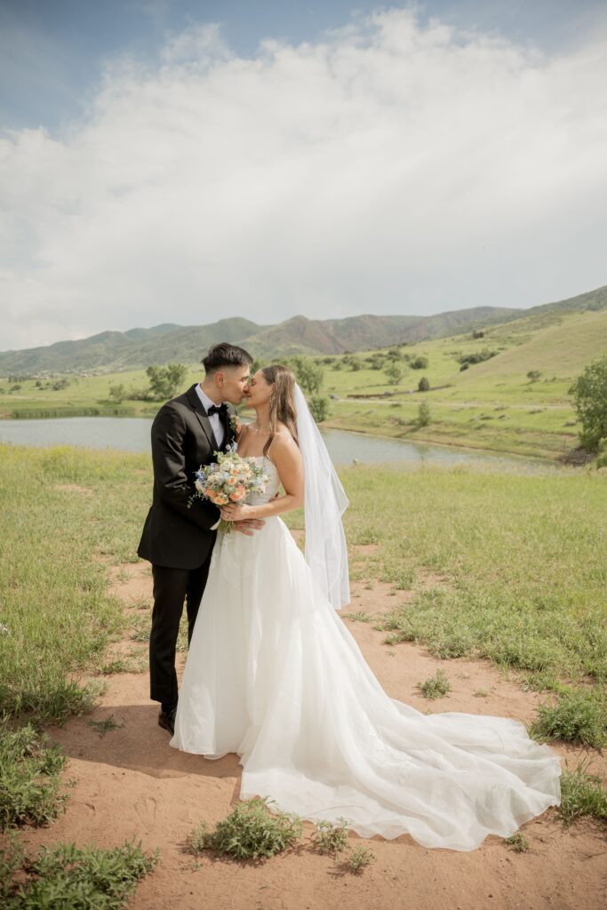 Bride and groom kissing