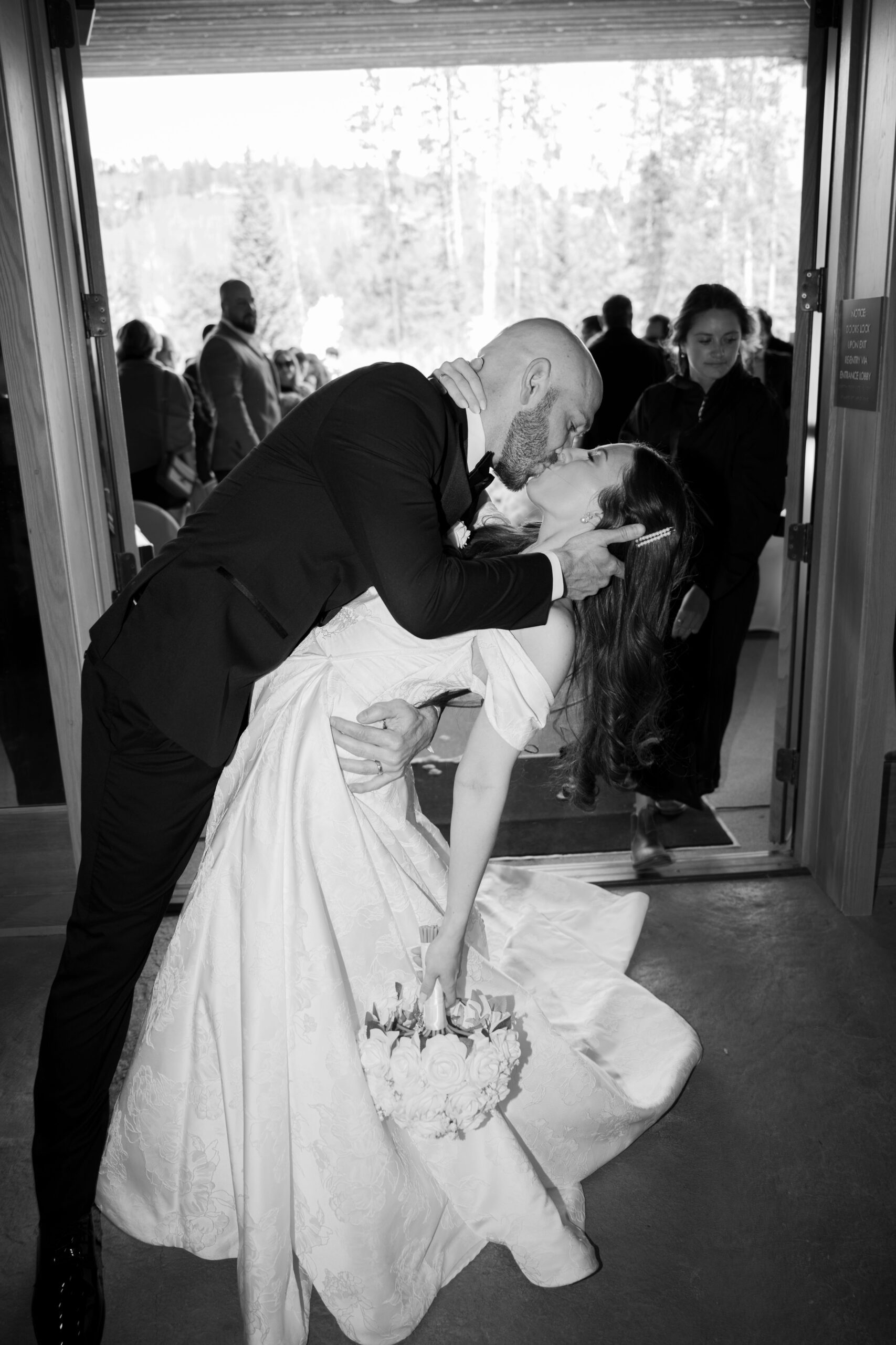 Bride and groom kissing
