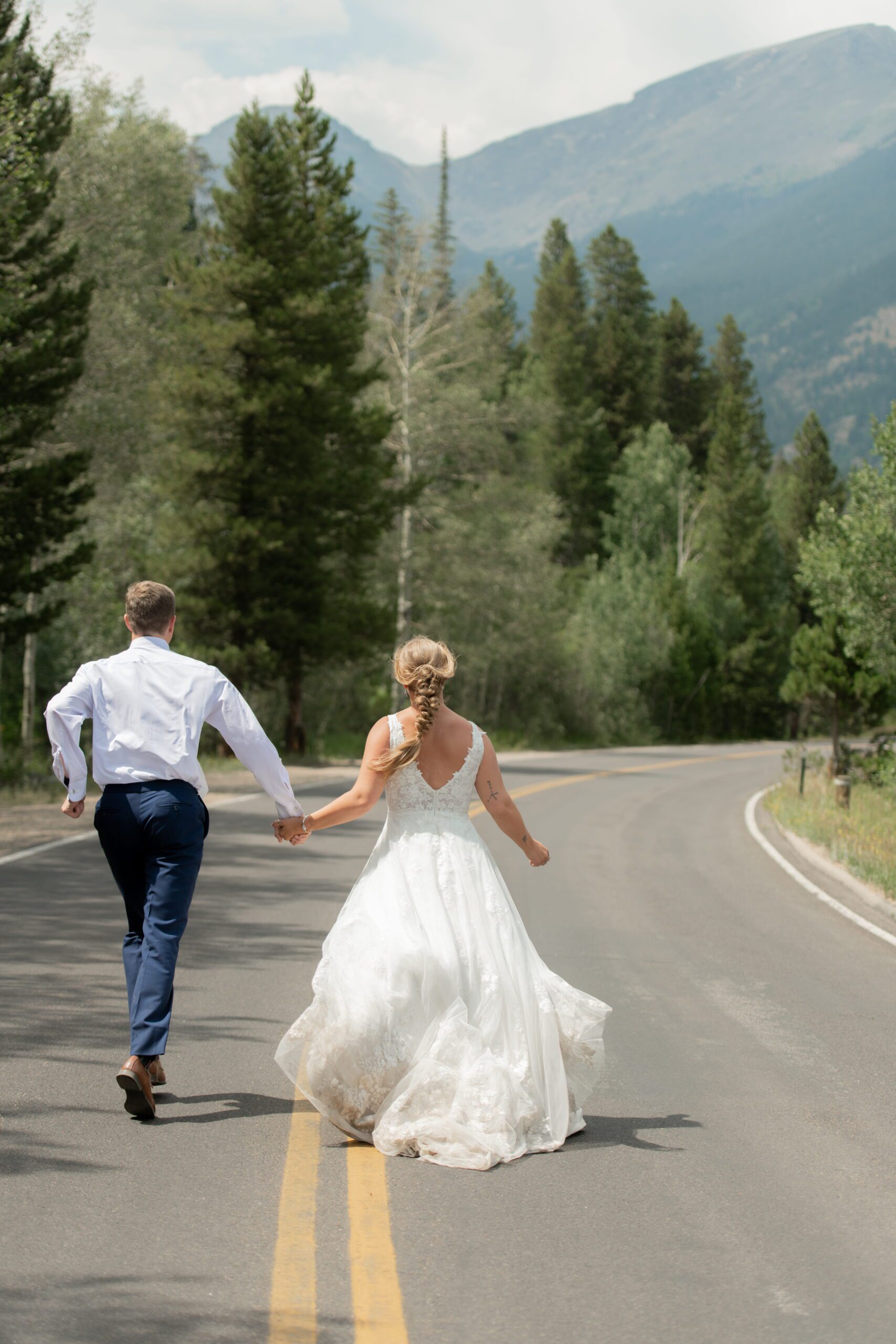 Bride and groom walking hand in hand