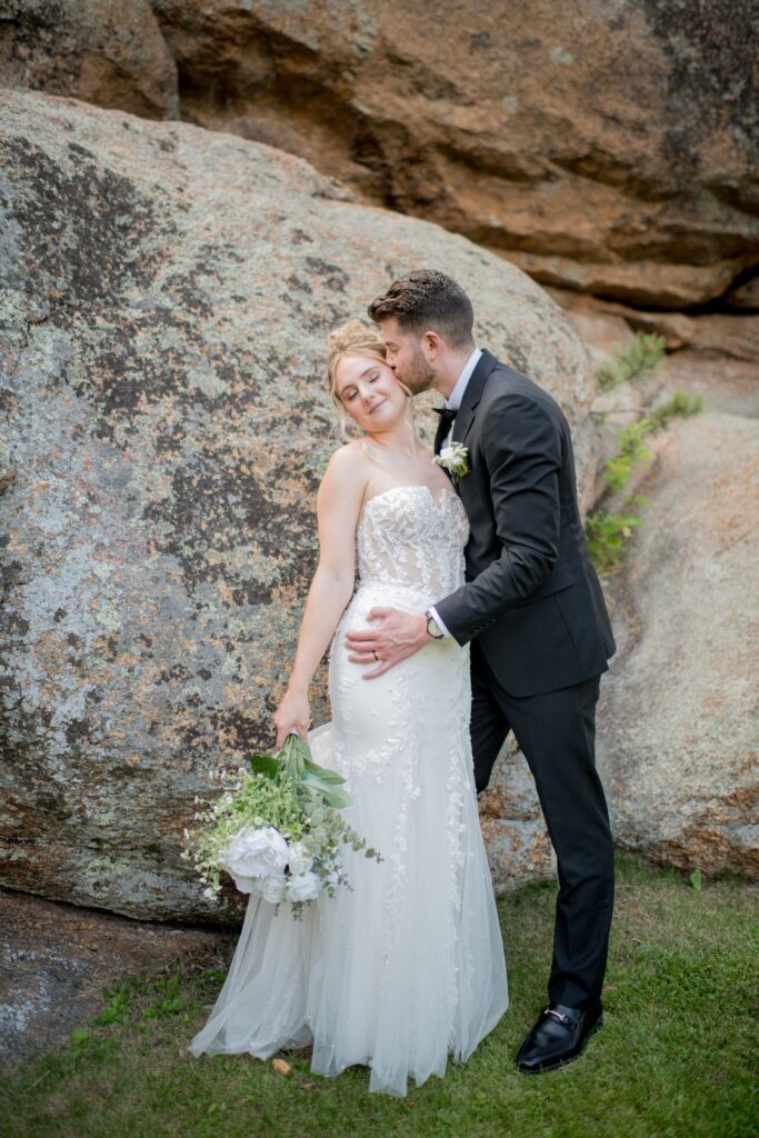 Groom kissing the bride