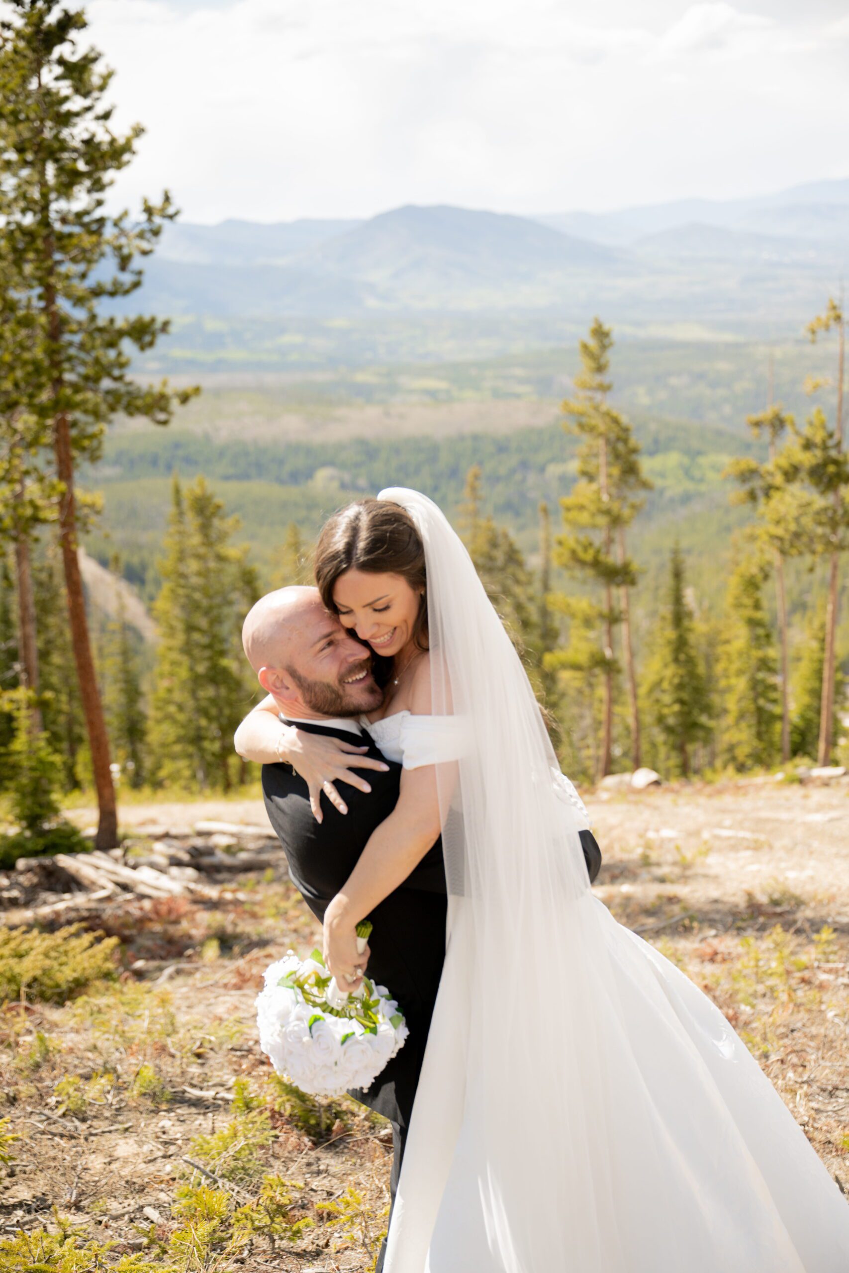 Groom lifting the bride